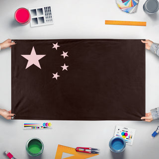 A mockup of the custom flag 'Loji TFR HOI4 Flag' held up on a table during print checking