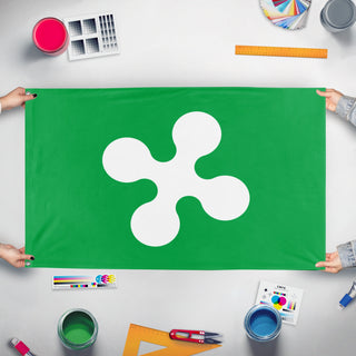 A mockup of the custom flag 'Lombardy Flag' held up on a table during print checking