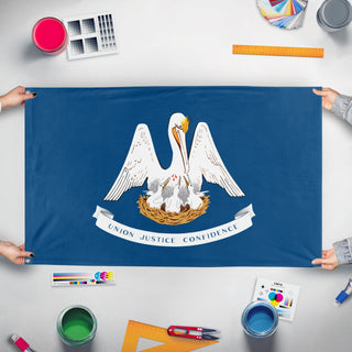 A mockup of the custom flag 'Louisiana State Flag' held up on a table during print checking