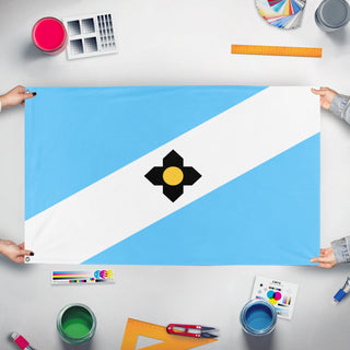 A mockup of the custom flag 'Madison City Flag' held up on a table during print checking