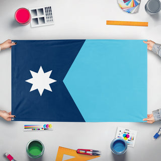 A mockup of the custom flag 'Minnesota State Flag' held up on a table during print checking