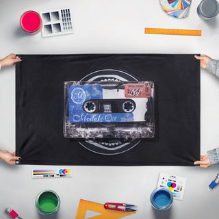 A mockup of the custom flag 'Model flag' held up on a table during print checking