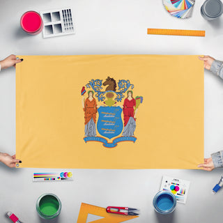A mockup of the custom flag 'New Jersey State Flag' held up on a table during print checking