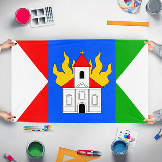 A mockup of the custom flag 'Novy Kostel flag' held up on a table during print checking