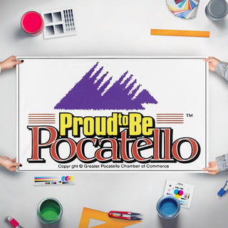 A mockup of the custom flag 'Old Pocatello Flag' held up on a table during print checking