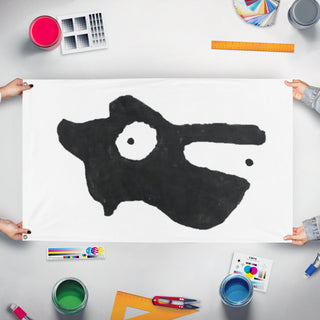 A mockup of the custom flag 'PelikanVargen flag' held up on a table during print checking