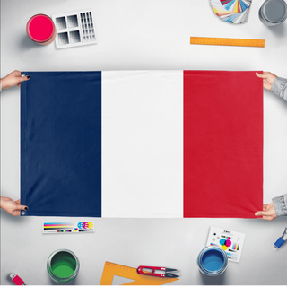 A mockup of the custom flag 'Plain France flag' held up on a table during print checking