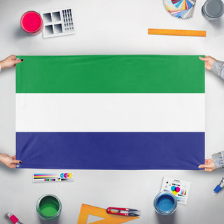 A mockup of the custom flag 'Rhine Confederation Flag' held up on a table during print checking