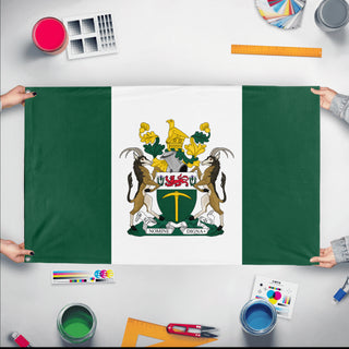 A mockup of the custom flag 'Rhodesia flag' held up on a table during print checking