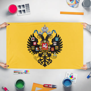 A mockup of the custom flag 'Russian Empire flag' held up on a table during print checking