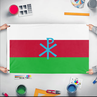 A mockup of the custom flag 'Snowlandian flag' held up on a table during print checking