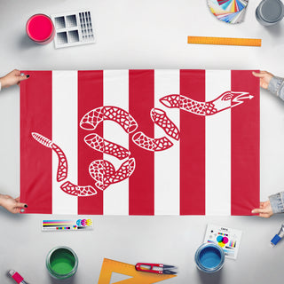 A mockup of the custom flag 'Sons of Liberty flag' held up on a table during print checking