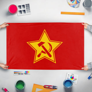 A mockup of the custom flag 'Spartacus League  flag' held up on a table during print checking