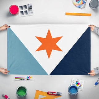A mockup of the custom flag 'Syracuse New York Flag Proposal' held up on a table during print checking