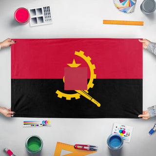 A mockup of the custom flag 'T flag' held up on a table during print checking