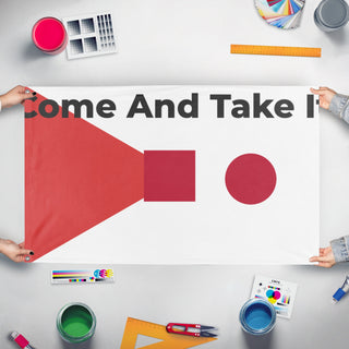 A mockup of the custom flag 'T flag' held up on a table during print checking