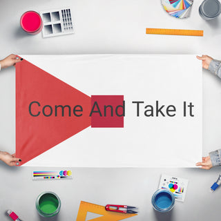 A mockup of the custom flag 'T flag' held up on a table during print checking