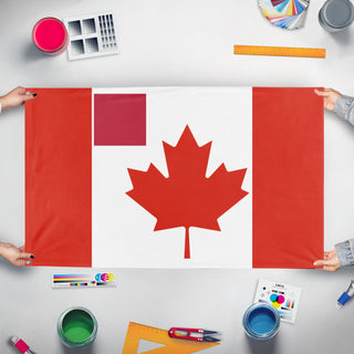 A mockup of the custom flag 'T flag' held up on a table during print checking