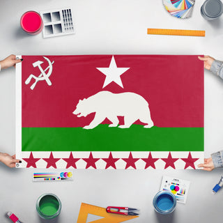 A mockup of the custom flag 'USR California flag' held up on a table during print checking
