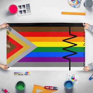 A mockup of the custom flag 'a flag' held up on a table during print checking