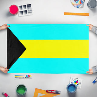 A mockup of the custom flag 'bahamas flag' held up on a table during print checking