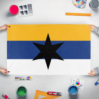 A mockup of the custom flag 'eguina flag' held up on a table during print checking