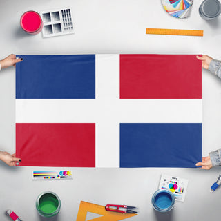 A mockup of the custom flag 'rep. Dominicana flag' held up on a table during print checking