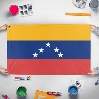 A mockup of the custom flag 'republica bolivana de venezuela flag' held up on a table during print checking