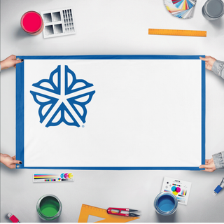 A mockup of the custom flag 'rr flag' held up on a table during print checking