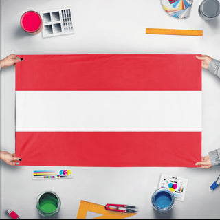 A mockup of the custom flag 'undefined flag' held up on a table during print checking