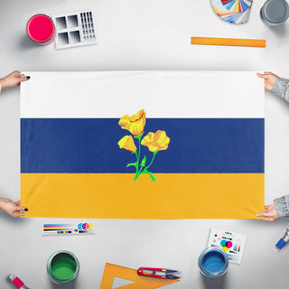 A mockup of the custom flag 'yuba county unofficial flag' held up on a table during print checking