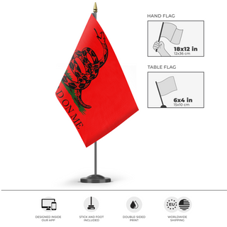 A mockup of the custom flag 'Socialist Gadsden flag' as a desk flag and small hand waving flag
