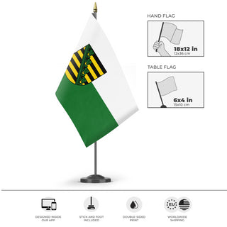 A mockup of the custom flag 'saxony flag' as a desk flag and small hand waving flag