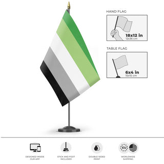 A mockup of the custom flag 'Aromantic Flag' as a desk flag and small hand waving flag