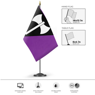 A mockup of the custom flag 'Labrys Lesbian Pride Flag' as a desk flag and small hand waving flag