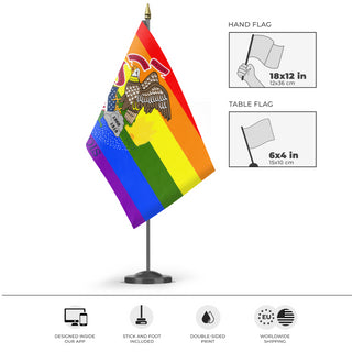 A mockup of the custom flag 'Illinois Pride Flag' as a desk flag and small hand waving flag