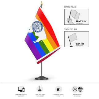 A mockup of the custom flag 'Wyoming Pride Flag' as a desk flag and small hand waving flag