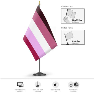 A mockup of the custom flag 'closeted lesbian flag' as a desk flag and small hand waving flag