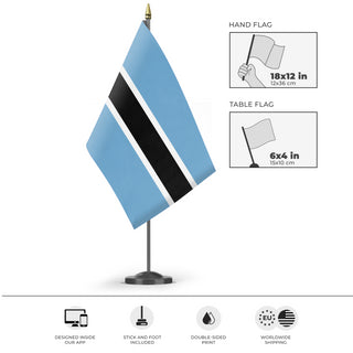 A mockup of the custom flag 'Flag of Botswana flag' as a desk flag and small hand waving flag