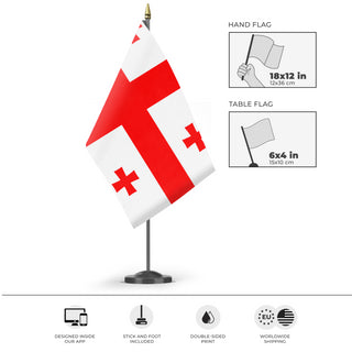 A mockup of the custom flag 'Flag of Georgia flag' as a desk flag and small hand waving flag