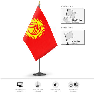 A mockup of the custom flag 'Flag of Kyrgyzstan flag' as a desk flag and small hand waving flag