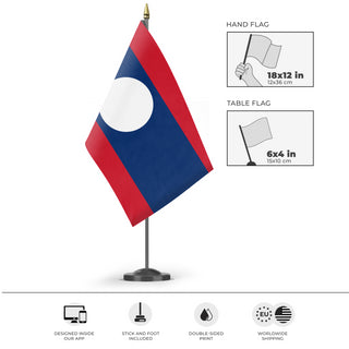 A mockup of the custom flag 'Flag of Laos flag' as a desk flag and small hand waving flag