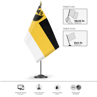 A mockup of the custom flag 'Russian Empire 1858 Eagle Flag' as a desk flag and small hand waving flag
