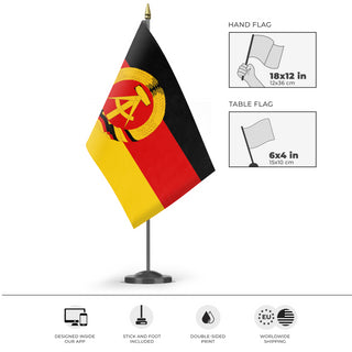 A mockup of the custom flag 'Socialist Germany Flag' as a desk flag and small hand waving flag