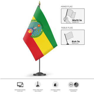 A mockup of the custom flag 'Socialist Ethiopia Flag' as a desk flag and small hand waving flag