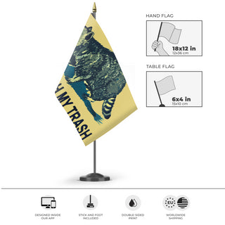 A mockup of the custom flag 'Don't Touch My Trash Flag' as a desk flag and small hand waving flag