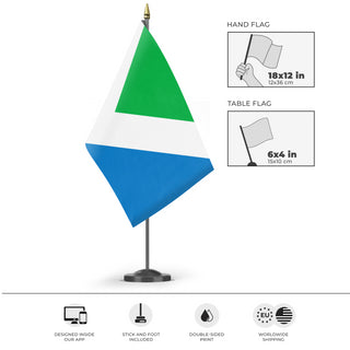 A mockup of the custom flag 'International Vegan Flag' as a desk flag and small hand waving flag