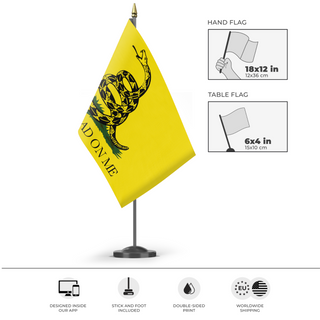 A mockup of the custom flag 'Gadsden Flag' as a desk flag and small hand waving flag