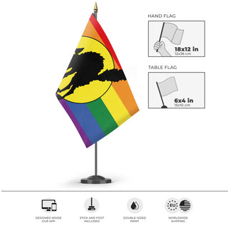 A mockup of the custom flag 'Pride Sabot Cat flag' as a desk flag and small hand waving flag