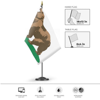 A mockup of the custom flag 'Bear. flag' as a desk flag and small hand waving flag